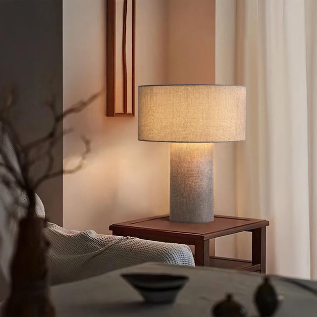 The Moonlight Table Lamp by Nova of California is a contemporary designer lighting piece that blends sculptural form with...