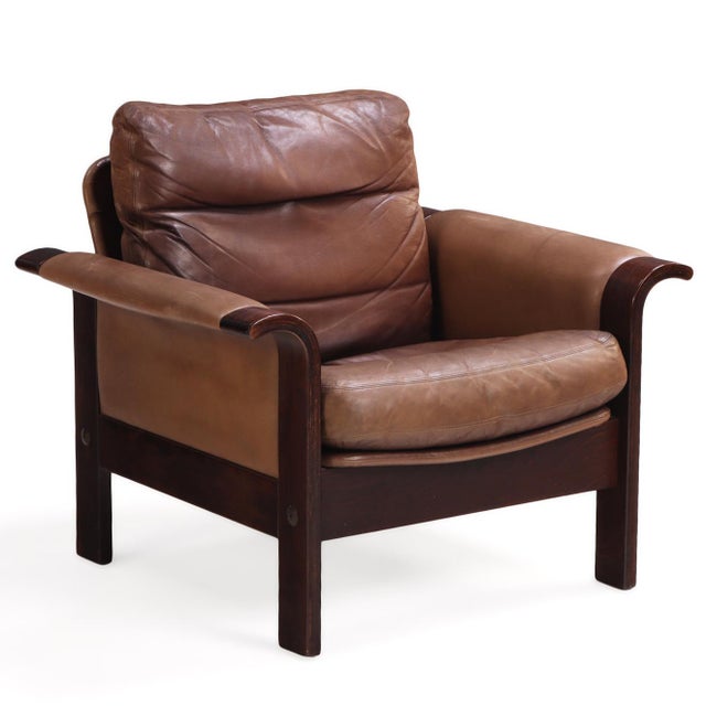 A refined pair of Danish modern lounge chairs designed by Georg Thams for A/S Vejen Polstermøbelfabrik, Denmark, circa...