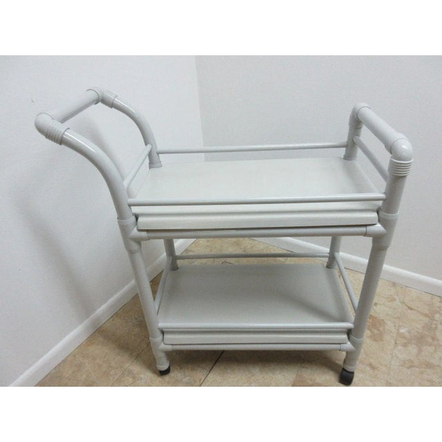 A vintage Mid-Century bar cart. Measurements ( l x w x h) 35.25 X 16.25 X 41" great shape. Tight and sturdy... Some light...