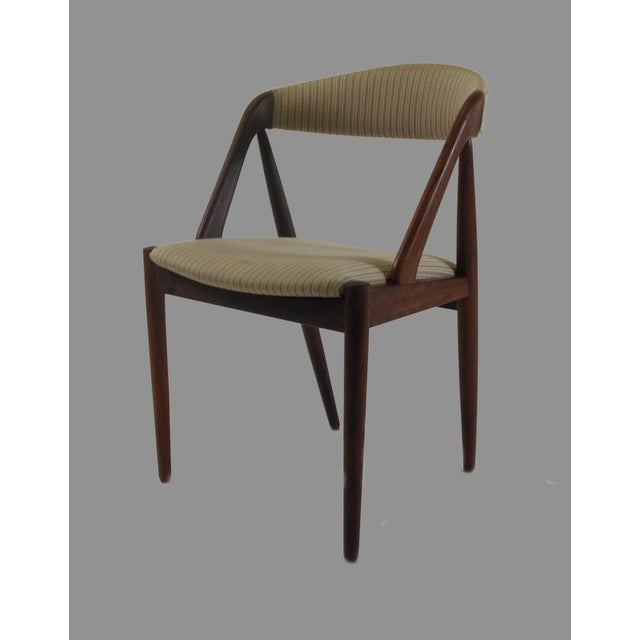 Model 31 is one of the most well-known chairs designed by Kai Kristiansen - a true Classic with its curved backrest,...