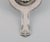 Cohr tea strainer in silver. Mid-20th century. Measure: Length: 14.3 cm. Stamped. In excellent condition. Our skilled...