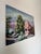A beautiful 1970s vintage oil on canvas depicting a serene desert landscape rendered in a loose Impressionist style....