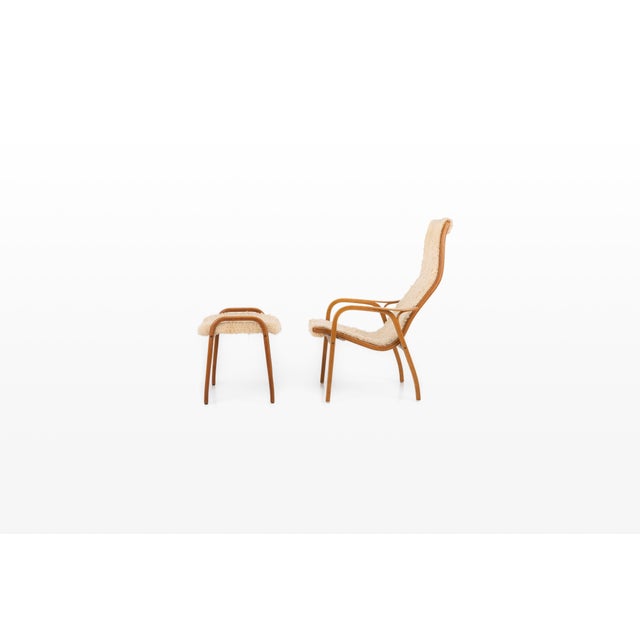 An original vintage lamino lounge chair with matching ottoman, designed by yngve ekström for swedese. First introduced in...