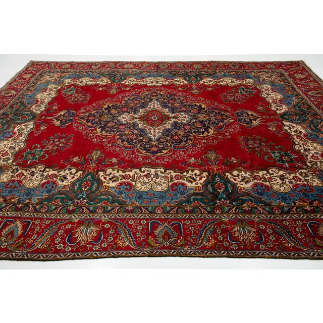 This Vintage Handmade Persian Tabriz Wool Rug in a Rich Red With a Rosette Motif For Sale In New York - Image 6 of 10