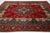 This Vintage Handmade Persian Tabriz Wool Rug in a Rich Red With a Rosette Motif For Sale In New York - Image 6 of 10