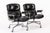 These vintage mid century modern black Model 3475 Eames Time Life Lobby Chairs designed by Charles & Ray Eames for Herman...