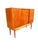 A striking tall Danish modern cabinet from the 1960s, distinguished by its two-material construction: teak door panels and...