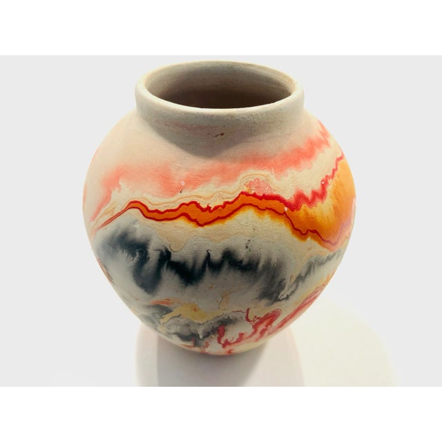 Super exciting , super colorful, Nemaji USA swirl Pottery vase with mark on the base. Unglazed, and in excellent...