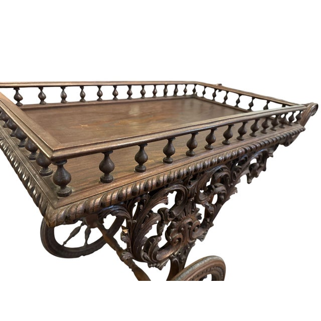 Stunning antique tea cart/bar cart from a villa in Knokke Heist, Belgium. The top tray features a finely turned balustrade...