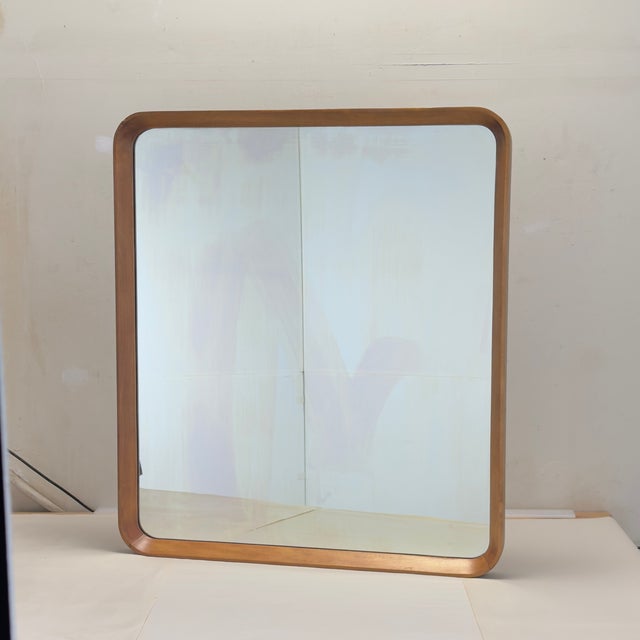 Vintage walnut mirror with stamp from the Max Posnick Furniture Company of New York. Can be hung vertically or horizontally.