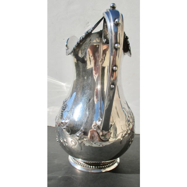 Gorham Coin Silver 250 hallmarked 1866. Art Nouveau silver pitcher. The measurements are 11" tall, 8.5" wide handle to...