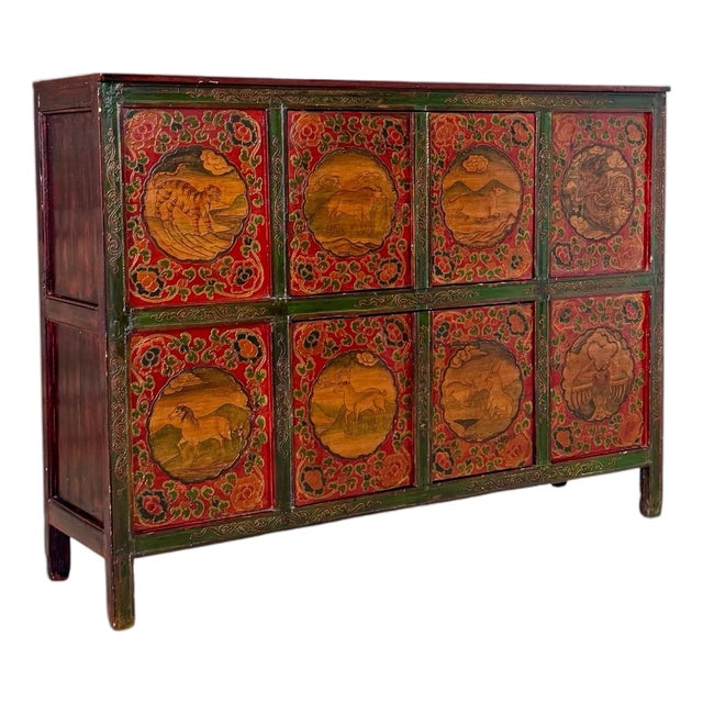 Vintage Tibetan Polychrome Painted Cabinet With Animal and Floral Panels For Sale