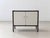 An elegant vintage chest of drawers by Victoria Baar from the 1970s. The piece captivates with its striking combination of...