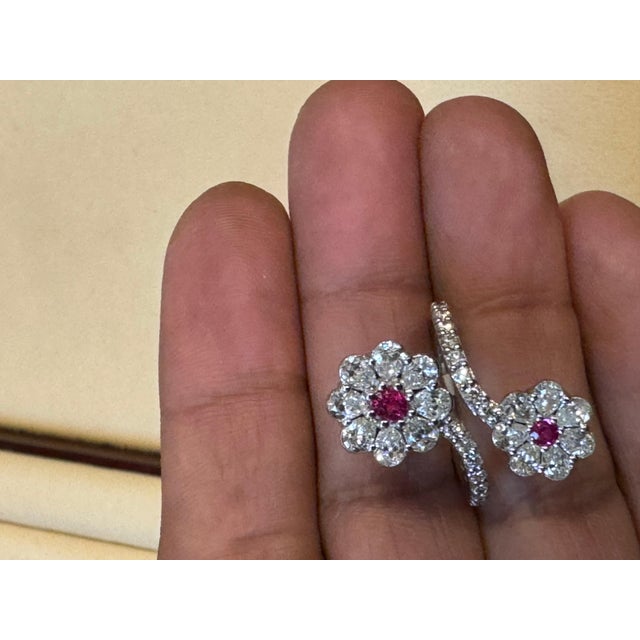 Introducing our exquisite 18 Karat Gold Ring, which showcases a stunning 0.30 Carat natural Ruby alongside 2 Carats of...