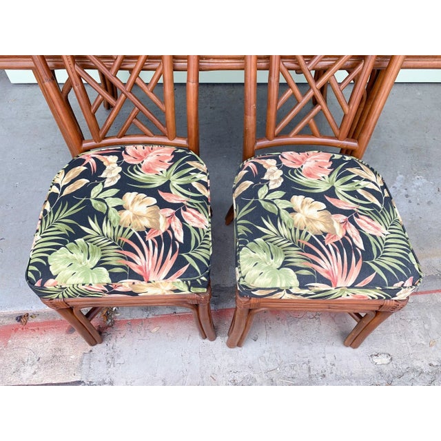 Palm Beach Regency Island Style Rattan Table and Four Chairs. All pieces are sold in nice as found vintage condition. See...