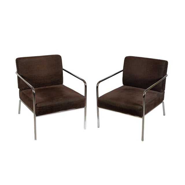 Chrome-plated tubular steel frame with padded seats and backrests upholstered in brown corduroy fabric. A simple and well-...