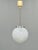 Elegant pendant light produced in czechoslovakia during the 1970s. The design features a beautifully proportioned opaline...