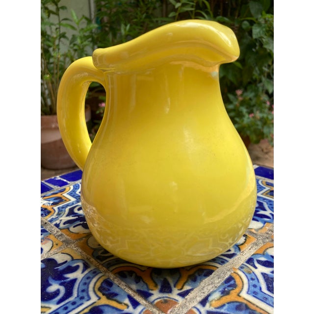 Very elegant authentic Haeger Yellow Pitcher. Just a beautiful piece to accent your collection of plates and decorative...