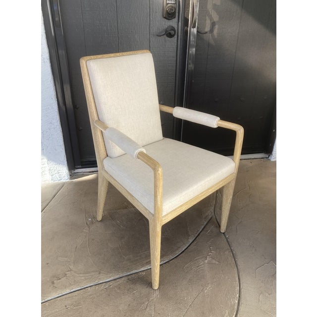A "Futura" arm chair designed by Michael Berman as a modern take on midcentury chairs in the vein of T.H. Robsjohn-...