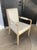 A "Futura" arm chair designed by Michael Berman as a modern take on midcentury chairs in the vein of T.H. Robsjohn-...