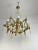 9-light chandelier attributed to Gaetano Sciolari in gilded brass and crystal, 1970s Intact and in good condition. E14...
