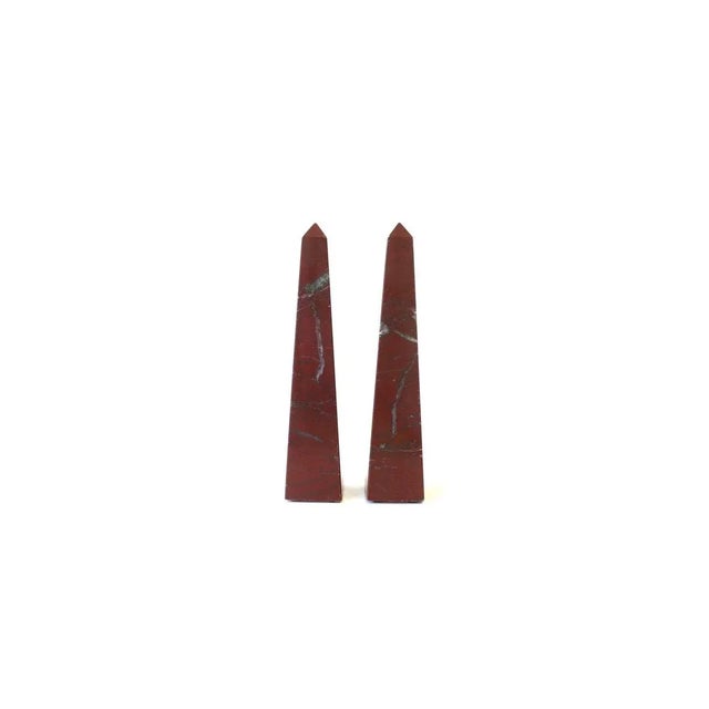 A beautiful pair of red burgundy Italian modern marble Obelisks, circa 1970s, Italy. Solid red burgundy marble with grey...
