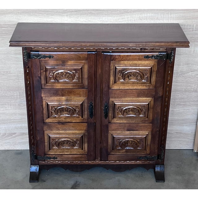 About the Item From Northern Spain, constructed of solid walnut, the rectangular top with molded edge atop a conforming...