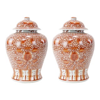 Pair of Chinese Late 19th - Early 20th Century Jingdezhen Kiln Iron Red Glaze 'Lotus Scroll' Covered Jars For Sale