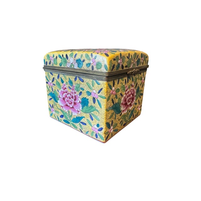 An early 20th century Chinese export famille rose porcelain jewelry casket of square form. The hand painted decoration...