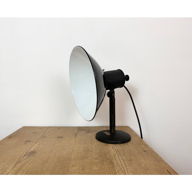 Vintage Industrial adjustable table lamp from former Czechoslovakia made during the 1950s. Was used in photo studios. It...