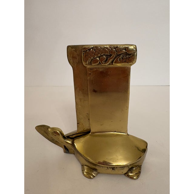 This pair of turtle bookends with intricately carved detailed shaped as turtles made in Korea in the 1950's are still as...