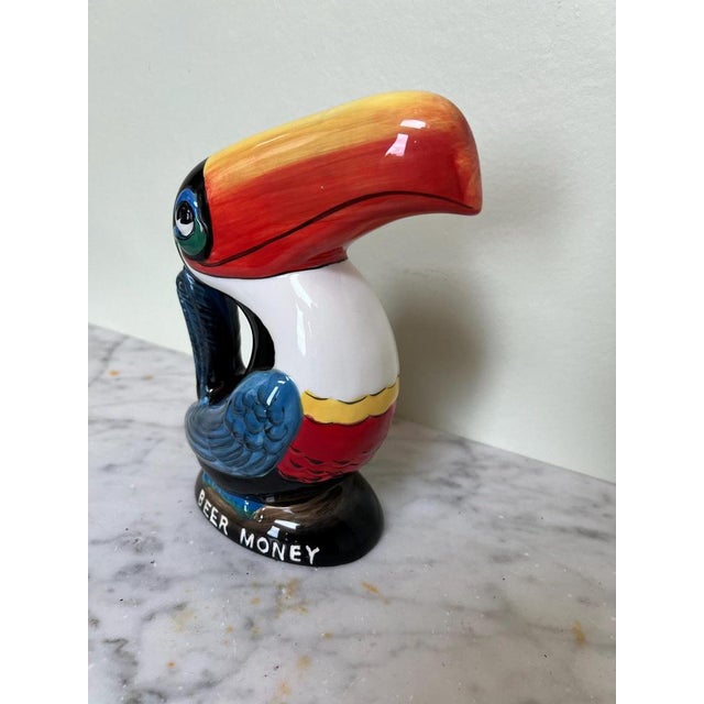 Ceramic John Gilroy inspired Guinness Toucan ‘beer money’ money box An endearing and useful example of John Gilroy’s...