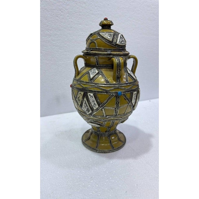 This striking Moroccan Moorish lidded ceramic urn is a beautifully handcrafted decorative piece, showcasing intricate...