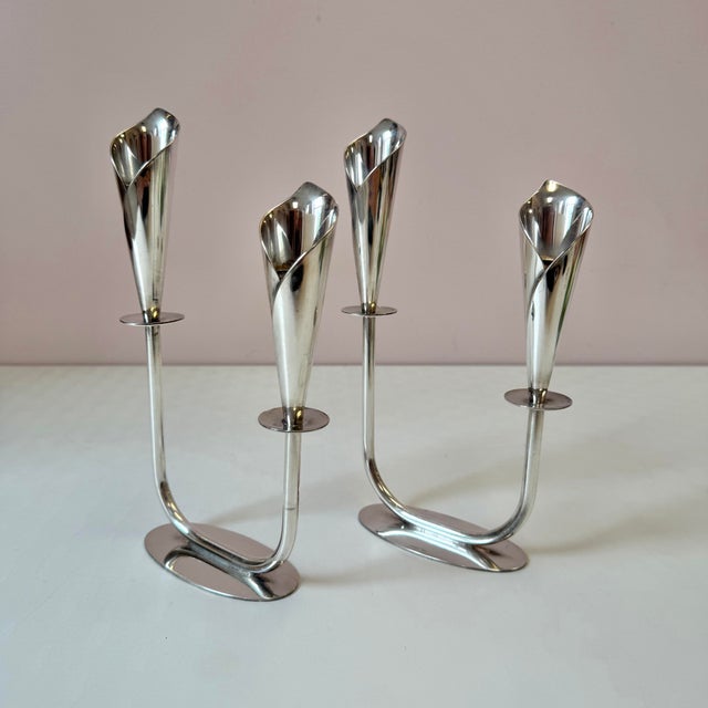A beautiful pair of mid-century silver plated candlestick holders in an elegant calla lily design, made in Denmark by Jans...