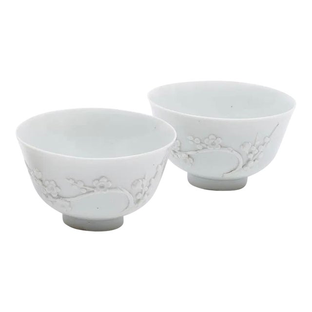 Antique 19th Century Chinese Export Blanc De Chine Porcelain Tea Cups or Bowls With Relief Molded Flowering Prunus Branches - A Pair For Sale