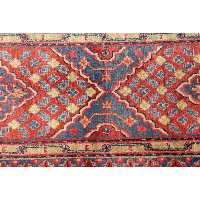 Antique Khotan Runner in Deep Indigo, Rust Red, and Soft Yellow Tones For Sale - Image 10 of 14