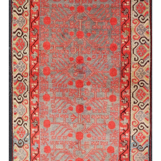 Early 20th Century Ntricate Vintage Khotan Rug With Sub-Geometric Design in Reds and Light Blue For Sale - Image 5 of 10