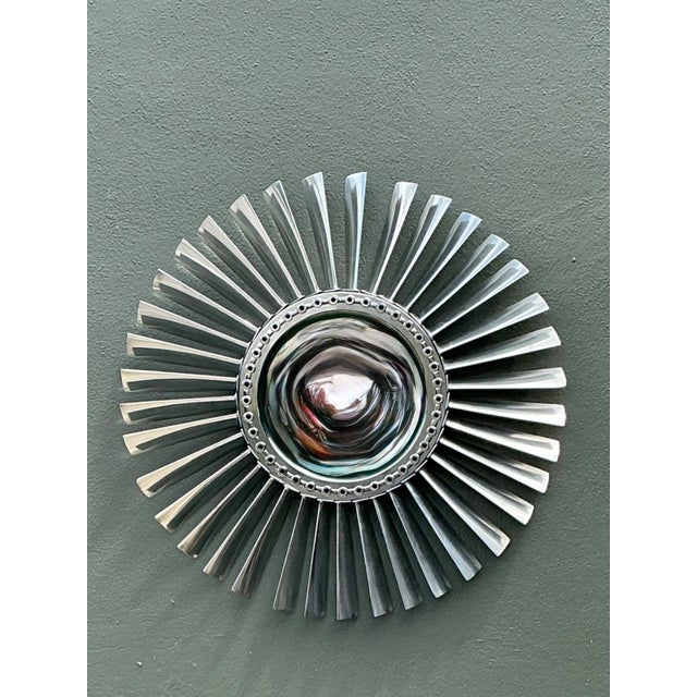 Inspired by the legendary Rolls-Royce Spey jet engine, this vintage industrial wall mirror transforms aerospace...