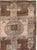 This Mid-20th century Turkish Anatolian accent carpet presents an imaginative, highly stylized composition arranged across...