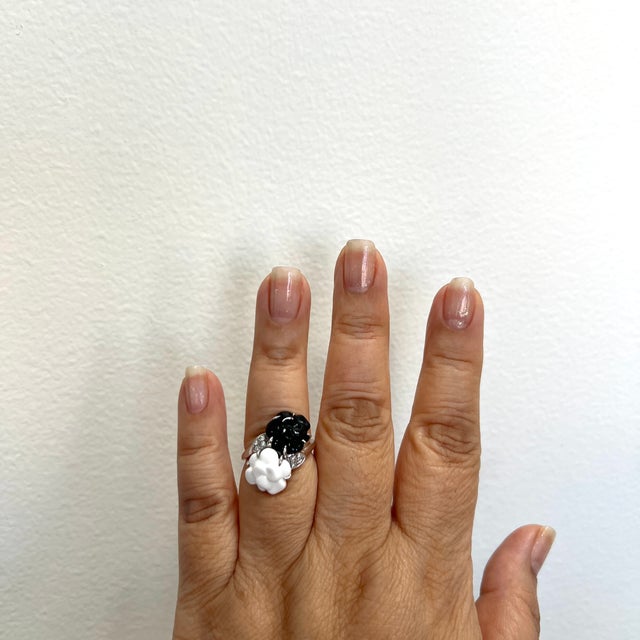 Estate Chanel agate, onyx, and white diamond Camelia ring handmade in 18k white gold. Ring size 6.75.