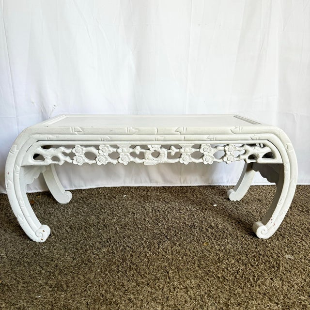 Elegance meets artistry in this Chinoiserie-style wooden coffee table or bench. Featuring gracefully curved legs and...