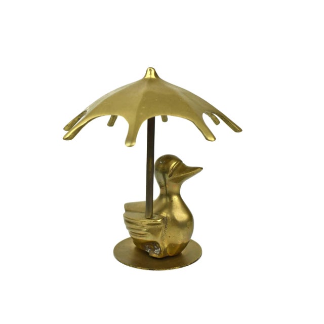 Vintage gold brass duck with umbrella on round base. It is unique accent home décor, great for your bookshelf, nursery...
