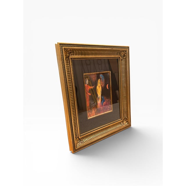 Decorative framed art print after Marc Chagall’s celebrated “Daphnis et Chloé – L’Echo,” presented in an impressive gilt...