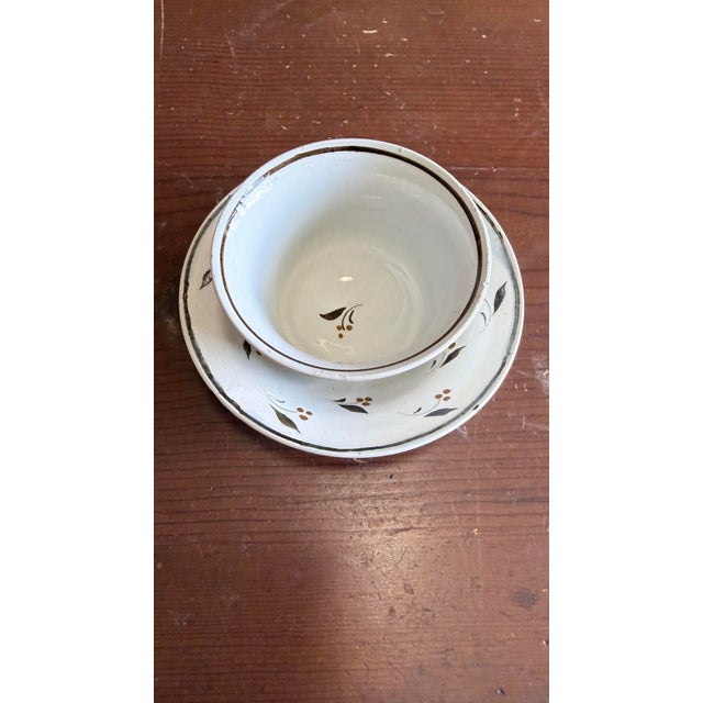 Antique Leeds Pearlware Cup and Saucer with Brown Foliate Decoration, Circa 1800 A charming and pristine example of early...