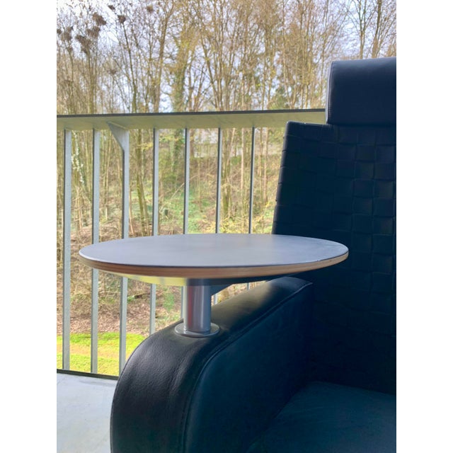 Original and unique. Postmodern, high-quality armchair on wheels with a fold-out table (45cm long). This piece has an...