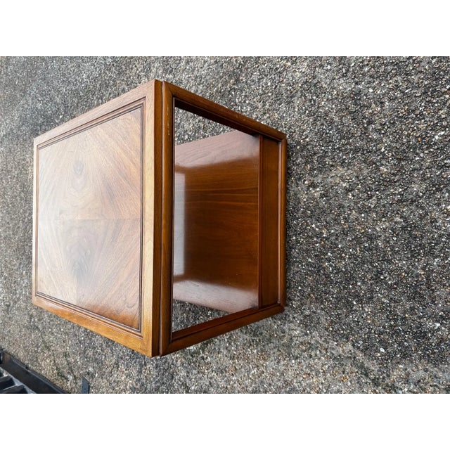 this is a finely crafted piece of furniture by Hekman. The top is made of figured Walnut. It has single drawer and a lower...