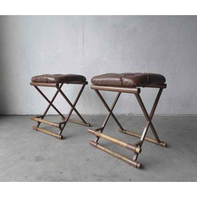 Nice pair of 1970's counter stools designed after Cleo Baldon. Frames are dark brown and so are the naugahyde seats. These...