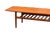 A stylish Danish coffee table in teak, designed by the famous designer Grete Jalk for Glostrup Møbelfabrik in Denmark. The...