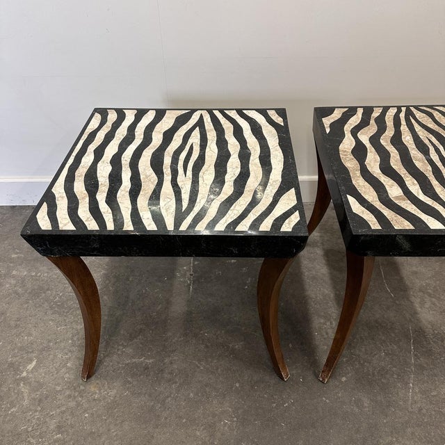 A captivating pair of Italian large side tables from the 1980s, showcasing exceptional craftsmanship and bold design. Each...