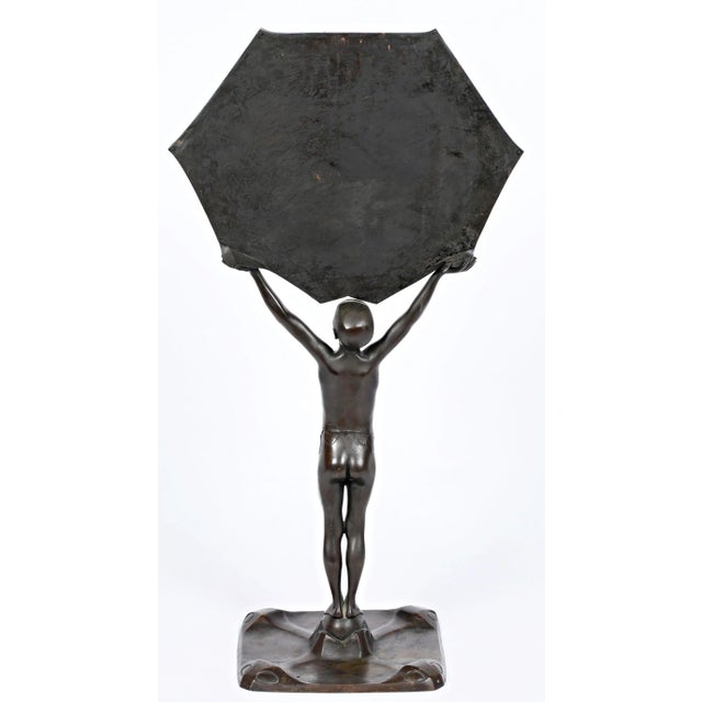 Peter Winter Heidingsfeld Heidingsfeld 1871 - 1920 Allach near Munich Young man with a mirror Bronze, signed 77x41.5x25cm...
